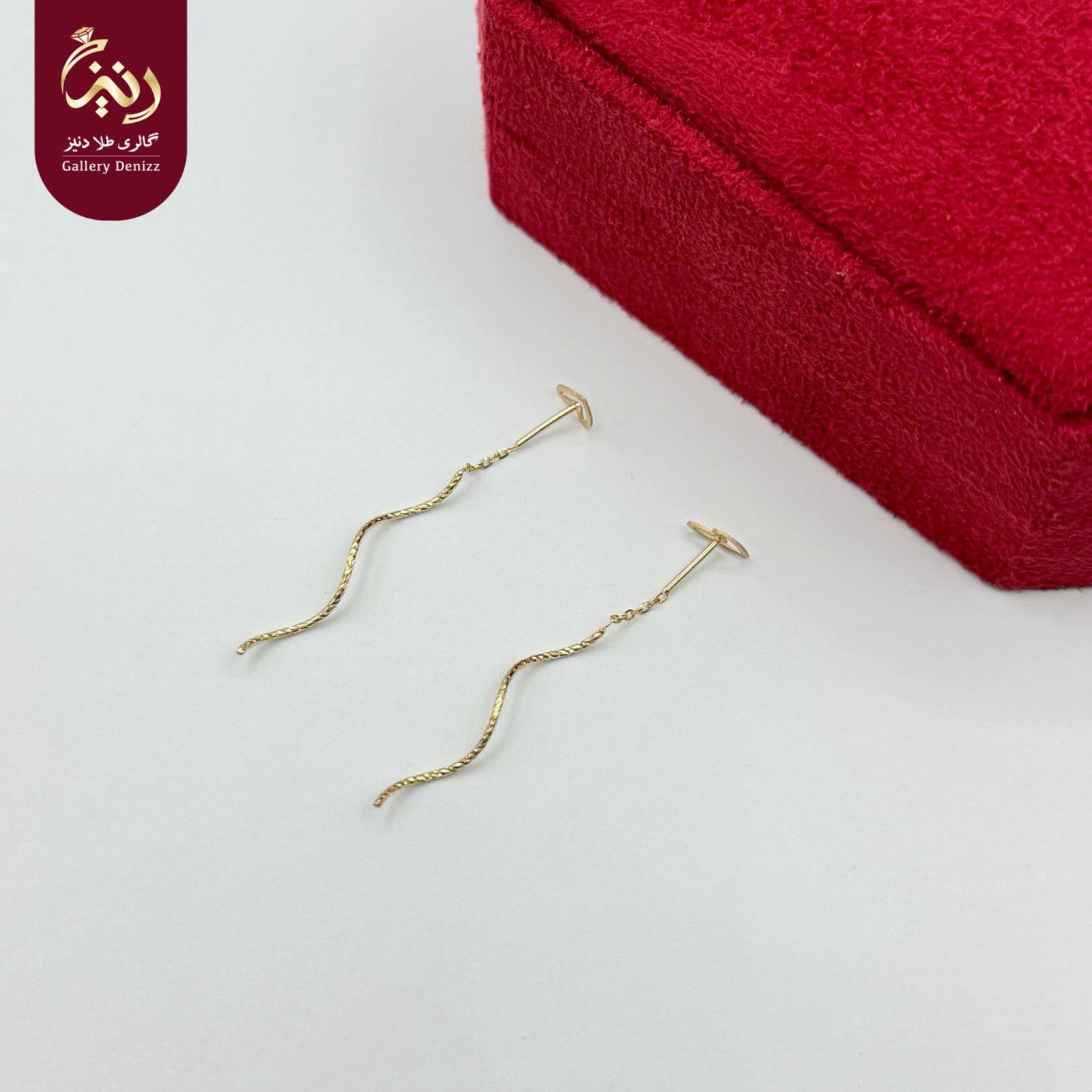 ⁨	گوشواره کرلی